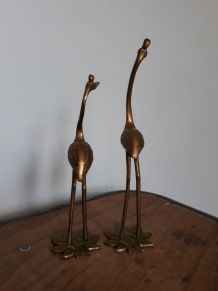 Hérons ou oiseaux échassiers en laiton