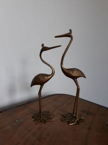 Hérons ou oiseaux échassiers en laiton
