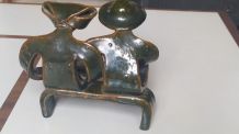 céramique bretonne couple sur un banc