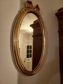 Miroir médaillon doré style Louis XVI