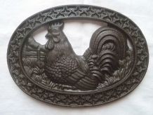 dessous de plat en fonte , vintage