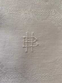 Nappe blanche en coton de fil damassé monogramme HB.
