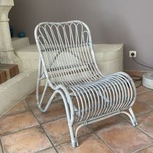 Fauteuil vintage en rotin arqué. 1970.