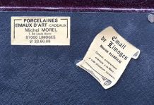 Tableau de fleurs en émail de Limoges signé al!herlig