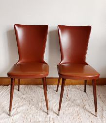 Paire de chaises Skaï vintage pieds compas 