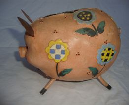 Tirelire cochon et fleurs