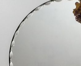 Beau miroir rond biseauté des années 30