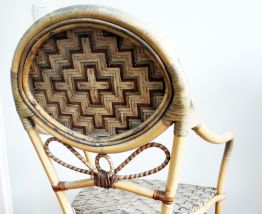 Fauteuil bistrot vintage en rotin 70's
