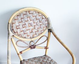 Fauteuil bistrot vintage en rotin 70's