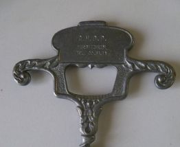 Ancien tire-bouchon décapsuleur, métal argenté 1960