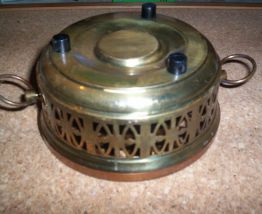 porte bougie parfuméé en métal cuivre dentellé 