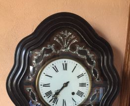 Horloge œil de bœuf 