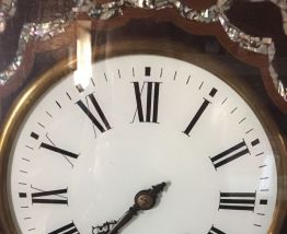 Horloge œil de bœuf 