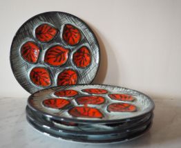 Lot en faïence de 6 assiettes à huîtres et 1 plat 