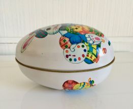 Grand oeuf jouet en fer blanc