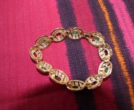 bracelet en laiton dore avec pierre année 80