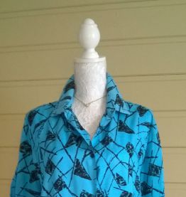 Chemisier vintage 80ies T36 à 44 turquoise motifs géométriques noirs