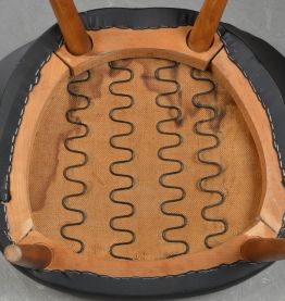 Fauteuil en cuir noir et laine