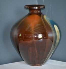 Vase boule en céramique vernis signé