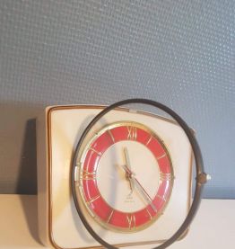pendule Jaz vintage en bakélite blanche et rouge 