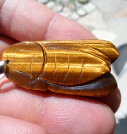 pendentif oeil de tigre sculpté