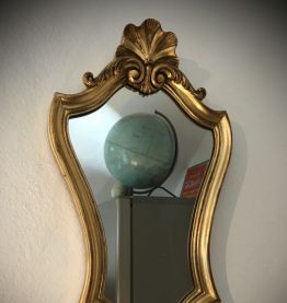 Miroir patiné doré 