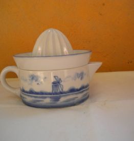 joli presse-citrons vintage en porcelaine