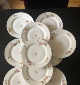 10 assiettes à décor d'oiseaux