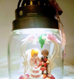 Lampe cage d'oiseaux argentée et rose à poser