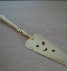 Pelle à tarte métal doré marque Priviloège