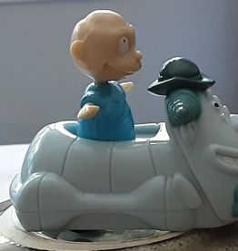 Figurine Casse bonbon dans son porteur 