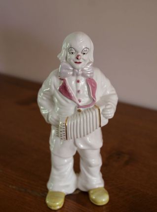 Statuette clown blanc accordéoniste en faïence