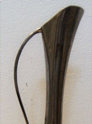 Aiguière en orfèvrerie argentée vase