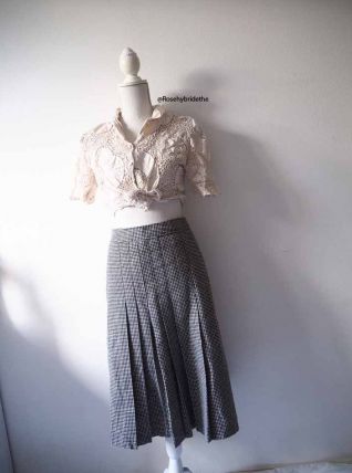 Jupe midi plissée en laine motifs pied de poule vintage 70's