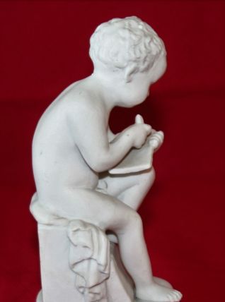 BISCUIT AMOUR LISANT D'APRÈS CANOVA.