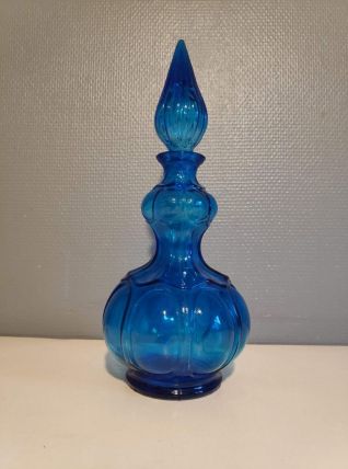 carafe bleue en verre avec bouchon flamme