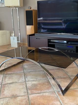 Table basse. Acier et verre fumé. 1970.