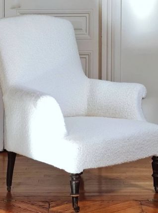 Fauteuil bergère laine bouclée