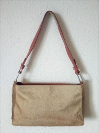 Sac Gérard Darel en cuir et fourrure 