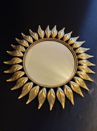 miroir soleil en métal doré