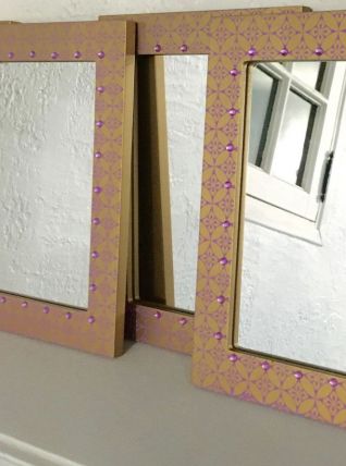 Quatre miroirs décorés