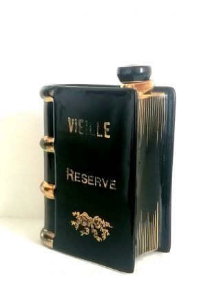 Flacon livre en céramique vintage 