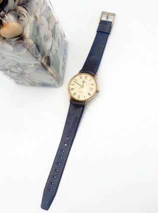 Superbe montre Eska quartz femme homme cadran doré