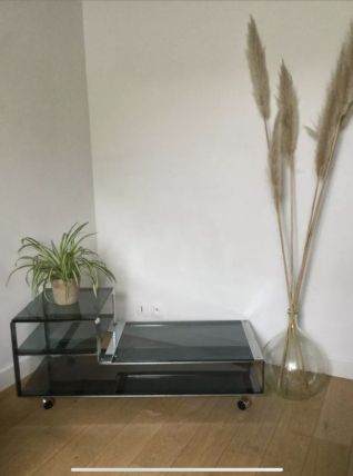 Table basse chrome et verre fumé