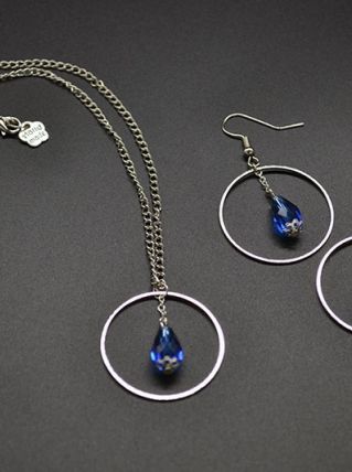 PARURE PERLE GOUTTE ENCERCLEE