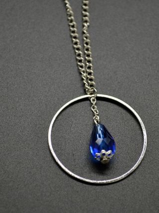 PARURE PERLE GOUTTE ENCERCLEE