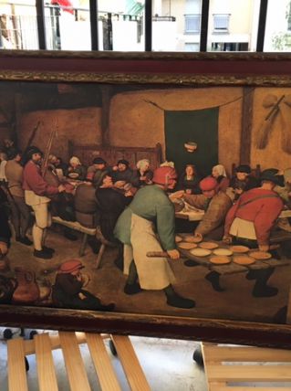 Cadre/Reproduction Repas de noces paysanes Pieter Bruegel