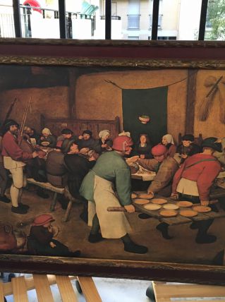 Cadre/Reproduction Repas de noces paysanes Pieter Bruegel