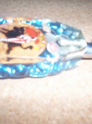 OUVRE BOUTEILLE EMAUX DES ANNEES 70 