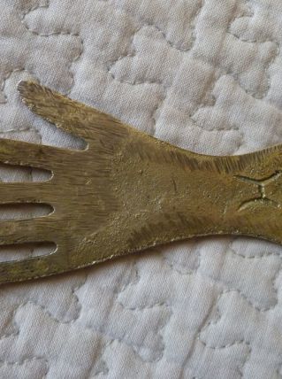 Décapsuleur vintage en forme de main